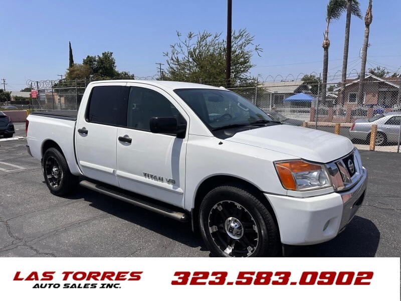 Brown (Tan) 2013 Nissan Titan Pickup Truck 4X2 5-Speed Automatic